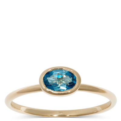 Oval Bezel Set Blue Topaz Ring, 14K