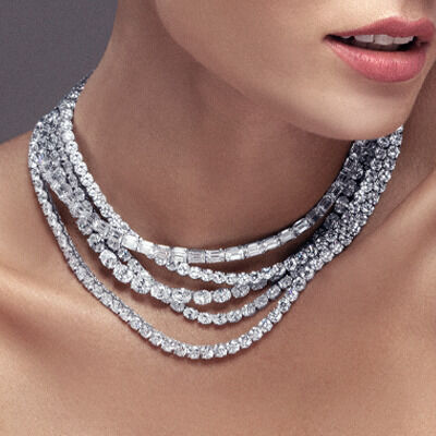 Layered diamond tennis bracelets