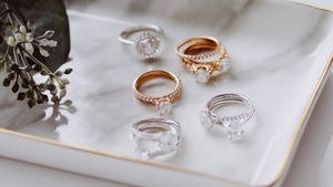 Diamond rings laying on jewelry tray